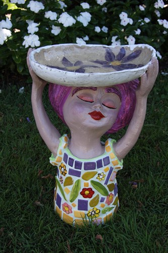 Small Garden Dweller Bird with with purple hair