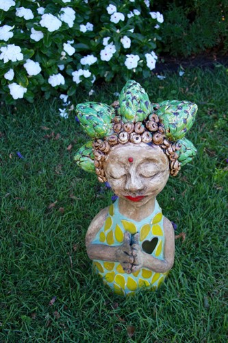 Small garden dweller with artichoke hair