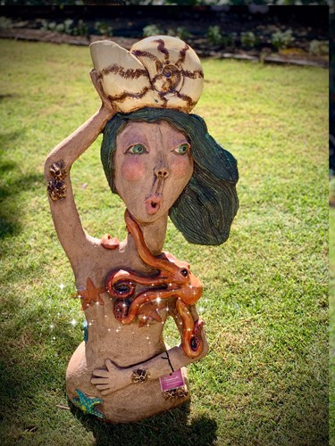 Lady with Nautilus Shell on Head