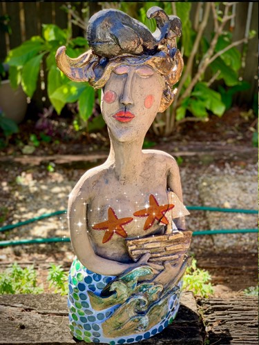 Lady with whale on head