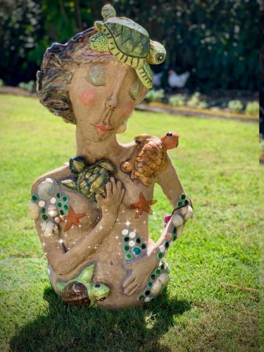 Girl with Baby Turtles