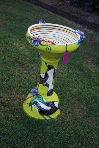 Birdbath with hand painted Magpies
