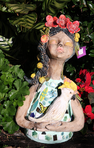 Poppies in her hair and Cockatoo in her arms