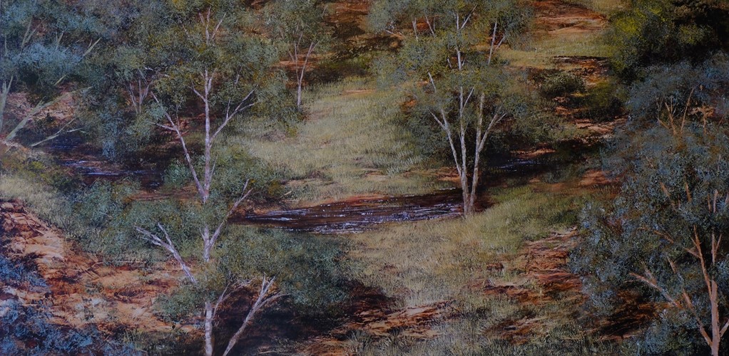 Rock Trees Grass and a creek