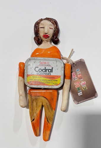 Codral 'Hanging Tin Doll'